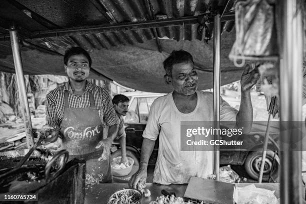 street food vendor in mumbai, india - mumbai stock pictures, royalty-free photos & images