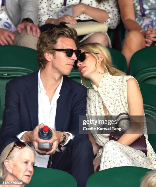 Poppy Delevingne and James Cook attend day seven of the Wimbledon Tennis Championships at All England Lawn Tennis and Croquet Club on July 08, 2019...