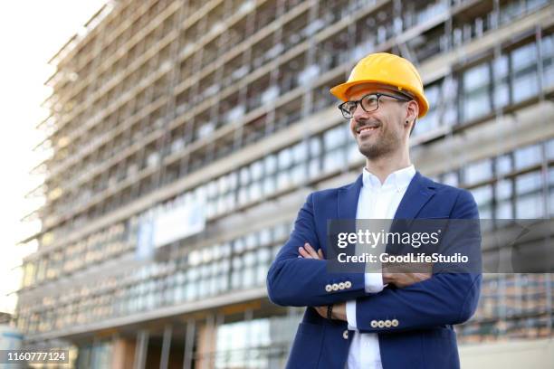 construction site - person in suit construction stock pictures, royalty-free photos & images