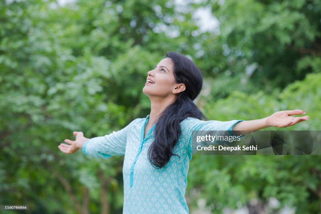 Young Woman Arms outstretched - stock images