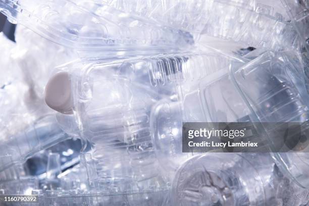translucent plastic packaging closely stacked together - polypropylene imagens e fotografias de stock