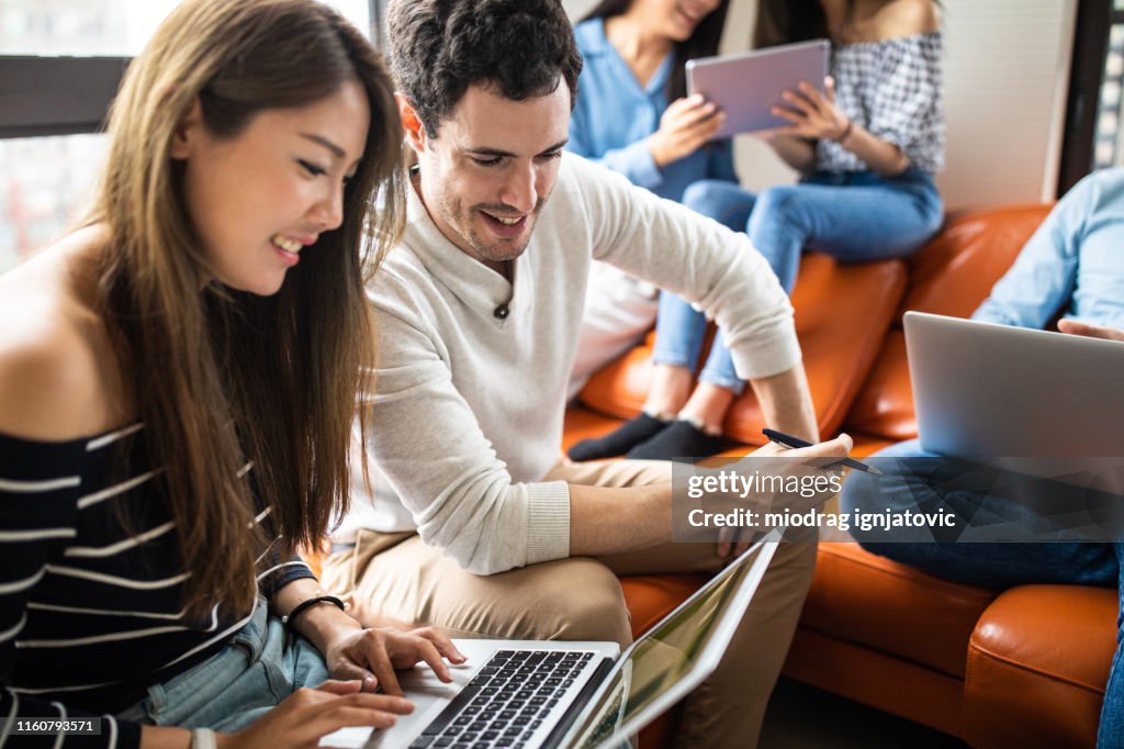 Millenial Using Technology Millennial People Using Portable Devices High-Res Stock Photo - Getty ...