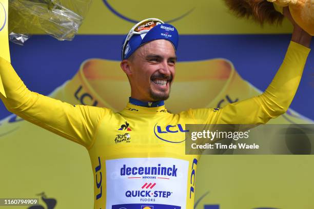 Podium / Julian Alaphilippe of France and Team Deceuninck - Quick-Step Yellow Leader Jersey / Celebration / Lion Mascot / during the 106th Tour de...