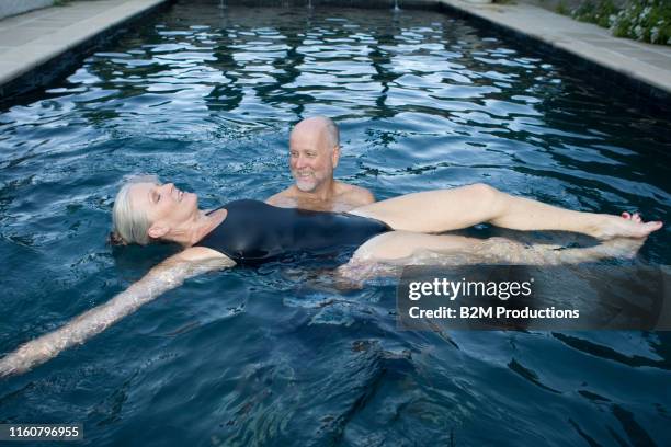 mature couple in swimming pool - 2010 2019 bildbanksfoton och bilder