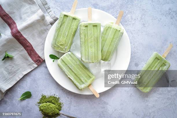 matcha green tea yogurt ice cream on stick - matcha tea stock pictures, royalty-free photos & images