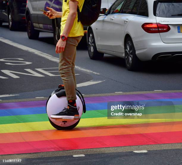rainbow pedestrain kreuzung - segway stock-fotos und bilder