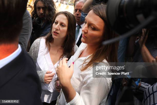 Two of the purported victims of multi-millionaire Jeffrey Epstein, Michelle Licata and Courtney Wild leave a Manhattan court house after a hearing on...