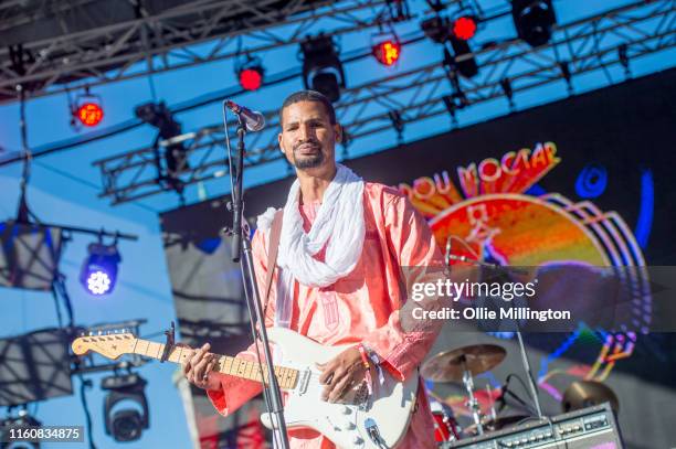 Mdou Moctar performs on the Hydro Quebec stage at Place D'Youville during Day 4 of the 52nd Festival D'été Quebec on July 7, 2019 in Quebec City,...