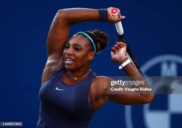 Serena Williams of the United States hits a shot against Marie Bouzkova of Czech Republic during a semifinal match on Day 8 of the Rogers Cup at...