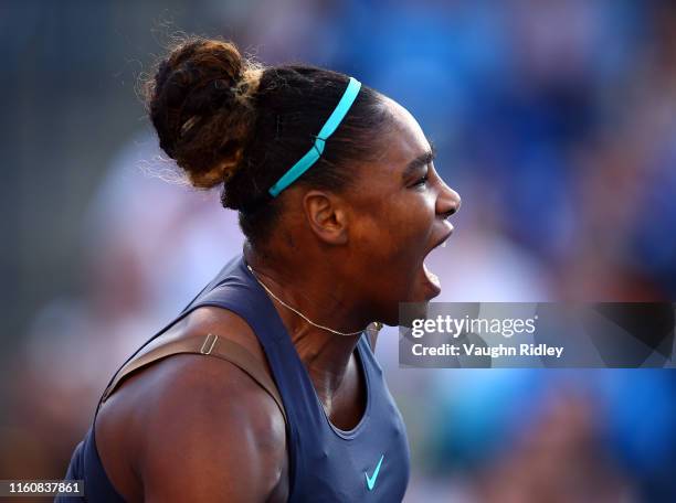 Serena Williams of the United States reacts after winning a point against Marie Bouzkova of Czech Republic during a semifinal match on Day 8 of the...