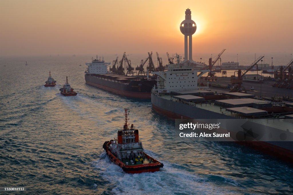 Tugs and freighter boats, Jeddah Harbor, Saudi Arabia