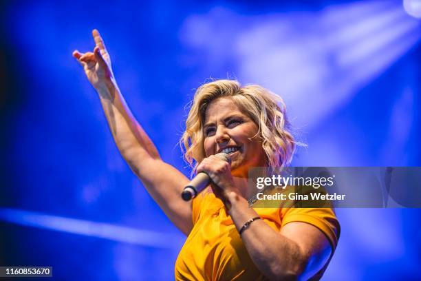 Swiss singer Beatrice Egli performs live on stage during the SchlagerOlymp Open Air festival at Freizeit und Erholungspark Luebars on August 10, 2019...