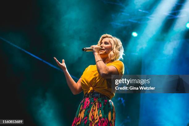 Swiss singer Beatrice Egli performs live on stage during the SchlagerOlymp Open Air festival at Freizeit und Erholungspark Luebars on August 10, 2019...