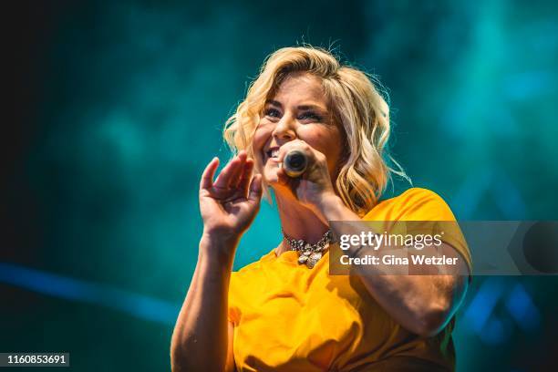 Swiss singer Beatrice Egli performs live on stage during the SchlagerOlymp Open Air festival at Freizeit und Erholungspark Luebars on August 10, 2019...