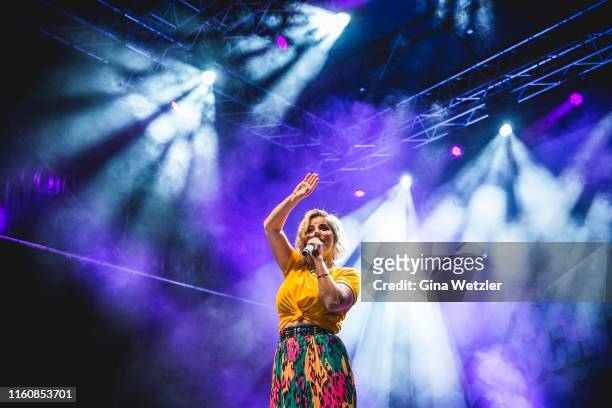 Swiss singer Beatrice Egli performs live on stage during the SchlagerOlymp Open Air festival at Freizeit und Erholungspark Luebars on August 10, 2019...