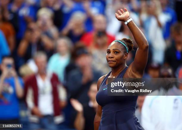 Serena Williams of the United States waves to the crowd after defeating Marie Bouzkova of Czech Republic following a semifinal match on Day 8 of the...
