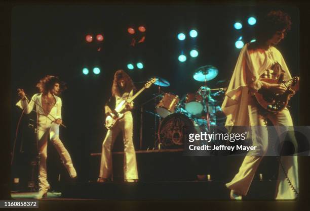Musicians Freddie Mercury, John Deacon, Roger Taylor and Brian May of Queen perform in concert on March 2, 1977 at The Forum in Inglewood, California.