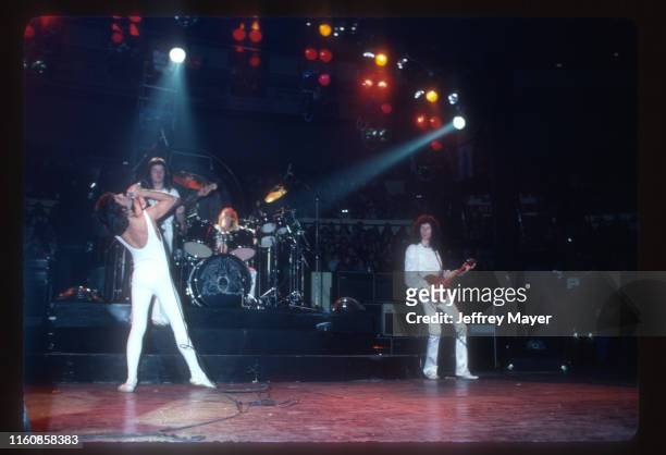 Musicians Freddie Mercury, John Deacon, Roger Taylor and Brian May of Queen perform in concert on December 18, 1977 at The Forum in Inglewood,...