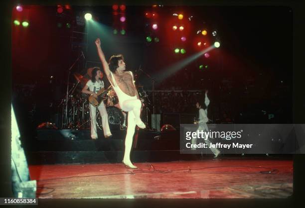 Musicians John Deacon, Freddie Mercury, Roger Taylor and Brian May of Queen perform in concert on December 18, 1977 at The Forum in Inglewood,...