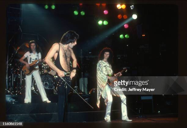 Musicians Freddie Mercury, John Deacon, Roger Taylor and Brian May of Queen perform in concert on December 22, 1977 at The Forum in Inglewood,...
