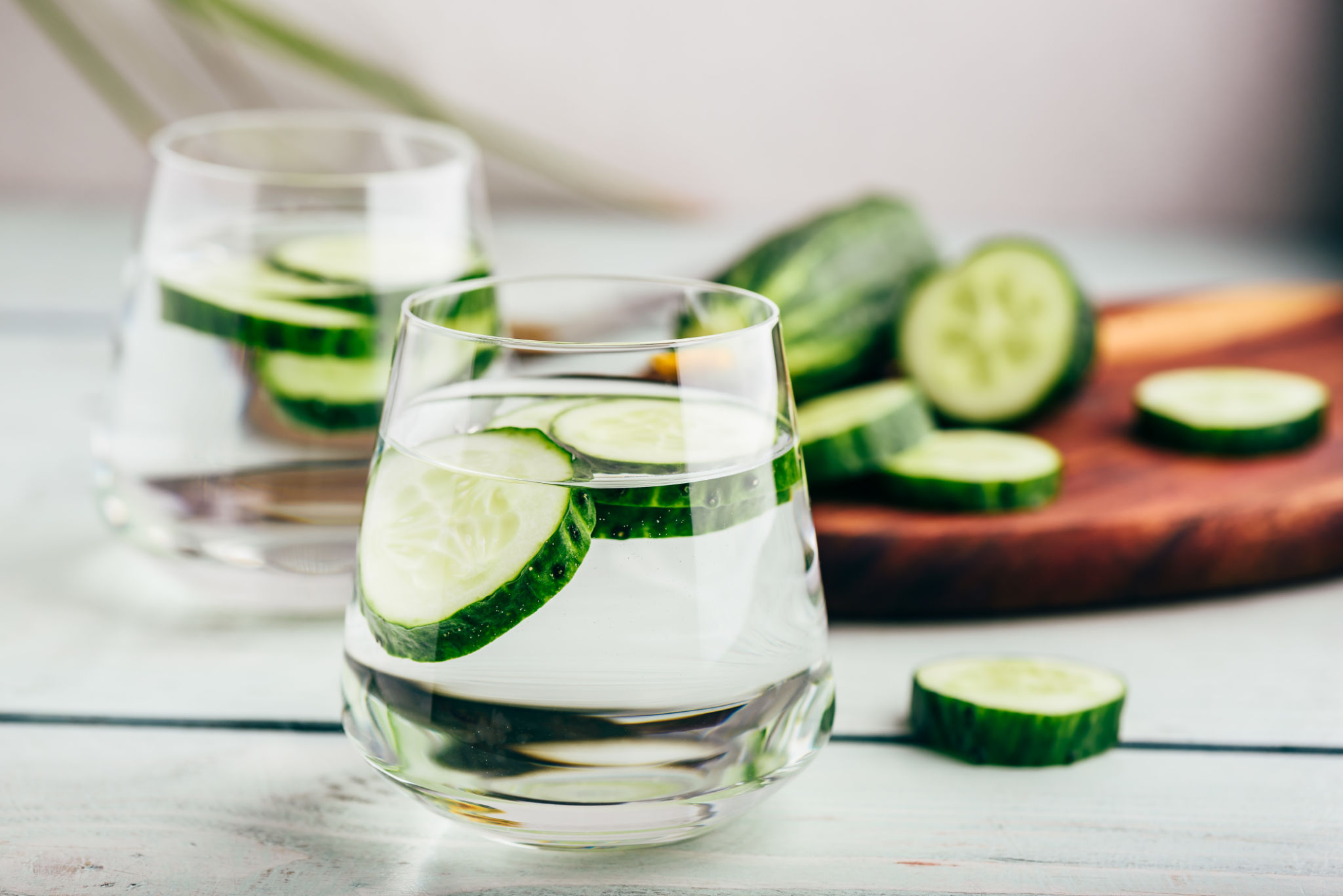 Water infused with sliced cucumber Water infused with sliced cucumber