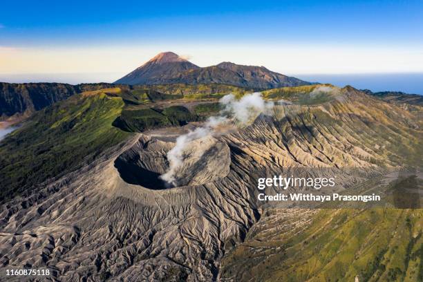 mount bromo volcano during sunrise, east java, indonesia - 火山　噴火　背景 ストックフォトと画像