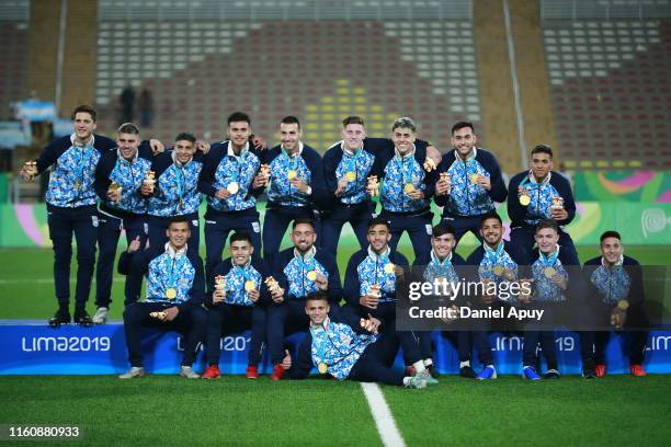 Players of Argentina celebrate after winning the gold medal in the Men´s Football on Day 15 of Lima 2019 Pan American Games at San Marcos Stadium on...