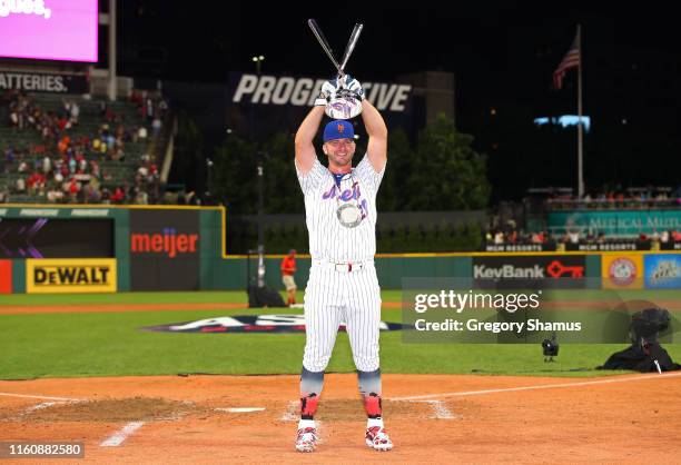 Pete Alonso of the New York Mets poses with the trophy after winning the T-Mobile Home Run Derby at Progressive Field on July 08, 2019 in Cleveland,...