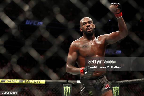 Jon Jones of the United States looks on after his after their UFC Light Heavyweight Title bout with Thiago Santos of Brazil at T-Mobile Arena on July...