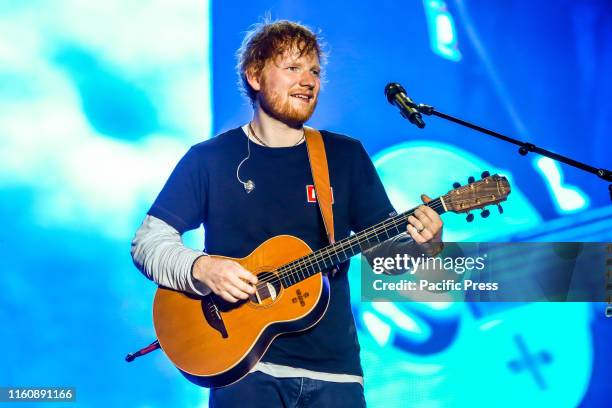 Edward Christopher Sheeran, English singer, songwriter, guitarist, record producer, and actor, performs during the first day of Sziget Festival in...