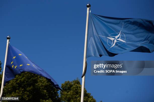 An European Union and NATO flags seen in Riga. Riga is the capital and largest city of Latvia, one of the Baltic States countries. Located on the...