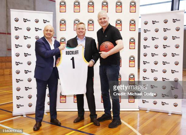 Tasmania Deputy Premier Jeremy Rockliff poses with NBL executive director Larry Kestelman and NBL legend Andrew Gaze during a NBL media opportunity...