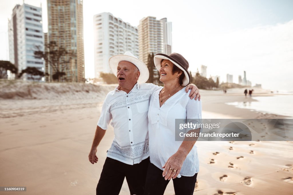 Happiness senior couple embracing lovely at dusk