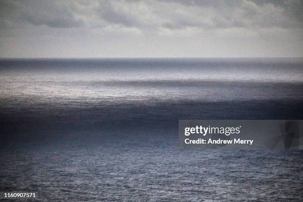 seascape with squall or storm at sea - dark ocean ripples stockfoto's en -beelden