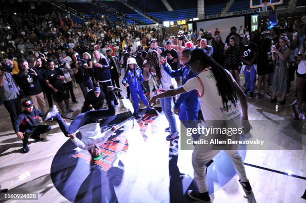 Ty Dolla $ign and Snoop Dogg perform during halftime of the Monster Energy $50K Charity Challenge Celebrity Basketball Game at UCLA's Pauley Pavilion...