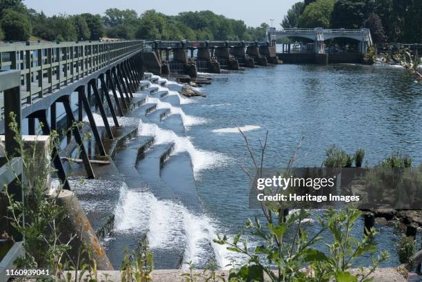 Teddington Lock, 28/6/10. Teddington Lock. These locks and weir mark the end of the tidal River Thames. This area is popular for leisure boating and...