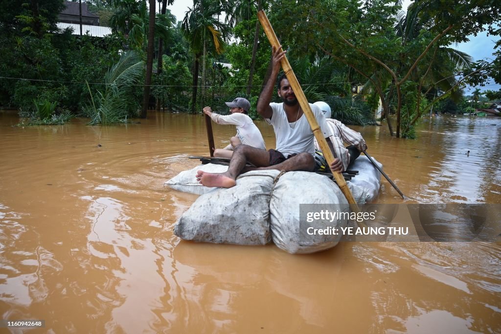 TOPSHOT-MYANMAR-FLOOD-LANDSLIDE