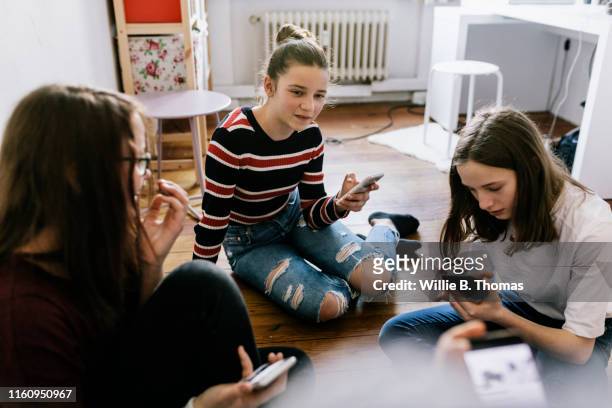 group of tweens with smartphone - voice search stock pictures, royalty-free photos & images