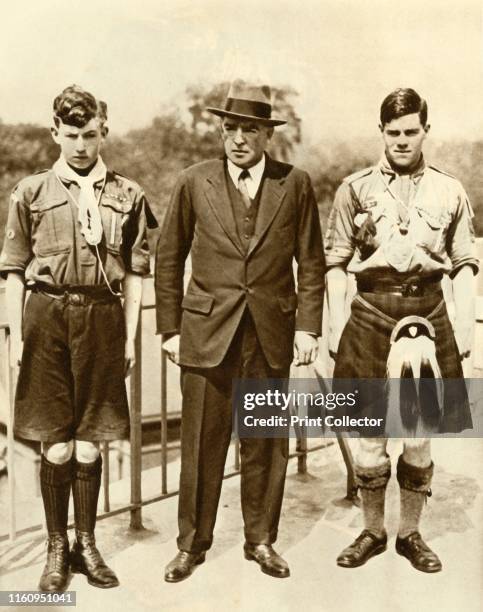 Ernest Shackleton with James Marr and Norman Mooney . British explorer Shackleton with boy scouts 'Marr and Mooney, specially chosen to accompany the...