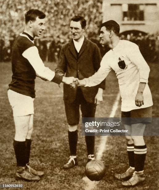 George Kay and Joe Smith shake hands before kick-off, FA Cup Final, Wembley Stadium, London, 28 April 1923, . George Kay , captain of West Ham...