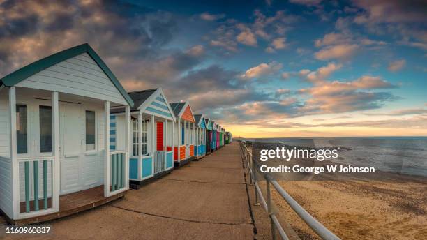 evening at the beach - beach hut fotografías e imágenes de stock