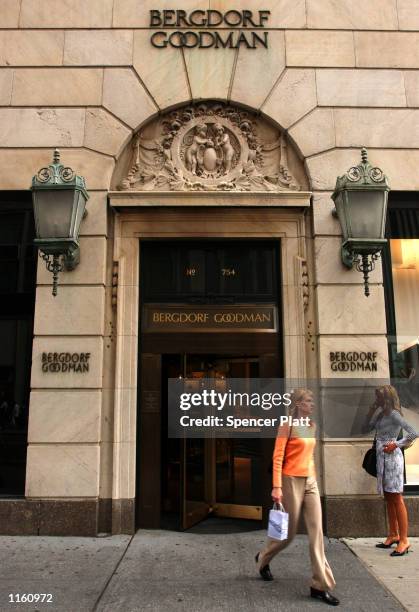 Woman leaves the luxury clothing store Bergdorf Goodman September 10, 2001 in New York City.