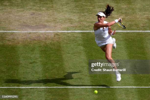 Johanna Konta of Great Britain plays a forehand in her Ladies' Singles Quarter Final match against Barbora Strycova of Czech Republic during Day...