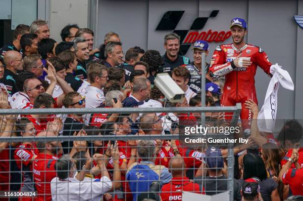Andrea Dovicioso of Italy and Ducati Team with his fans after the MotoGp of Austria - Race at Red Bull Ring on August 11, 2019 in Spielberg, Austria.