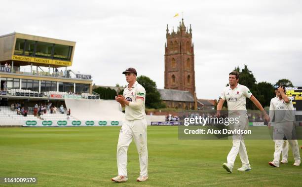 Tom Abell of Somerset leads his side off during Day Three of the Specsavers County Championship Division One match between Somerset and...