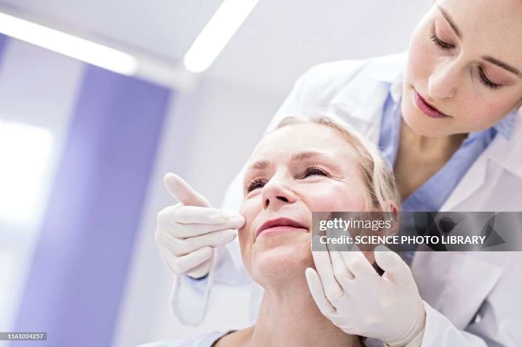 Doctor examining patient