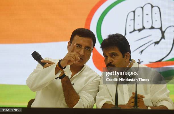 Congress leaders K C Venugopal and Randeep Surjewala during a press conference after attending the Congress Working Committee meeting, at AICC...