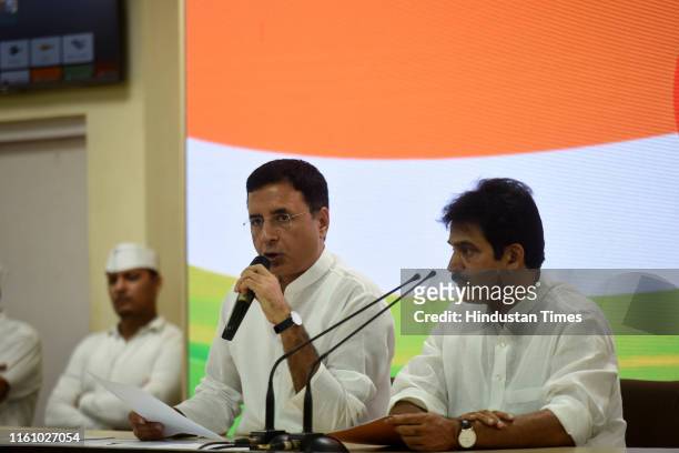 Congress leaders K C Venugopal and Randeep Surjewala during a press conference after attending the Congress Working Committee meeting, at AICC...