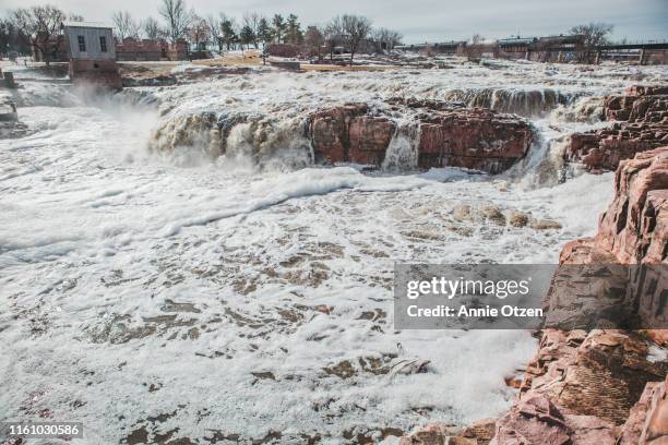 sioux falls, south dakota’s falls park on a late winter day - sioux falls stock pictures, royalty-free photos & images