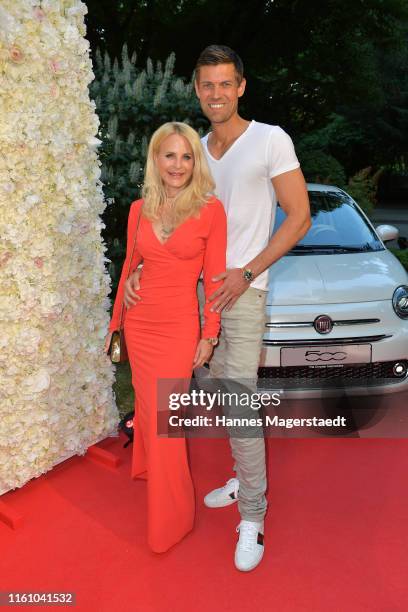 Sonja Kiefer and Cedrik Schwarz attend the Red Summer Night by Bunte.de at Rocco Forte The Charles Hotel on July 09, 2019 in Munich, Germany.